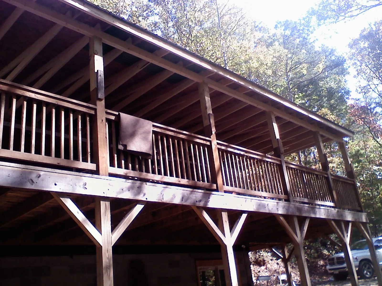 Timber framing under a new elevated porch and deck — Roof Leak Repair in Covington by Roofing Brothers